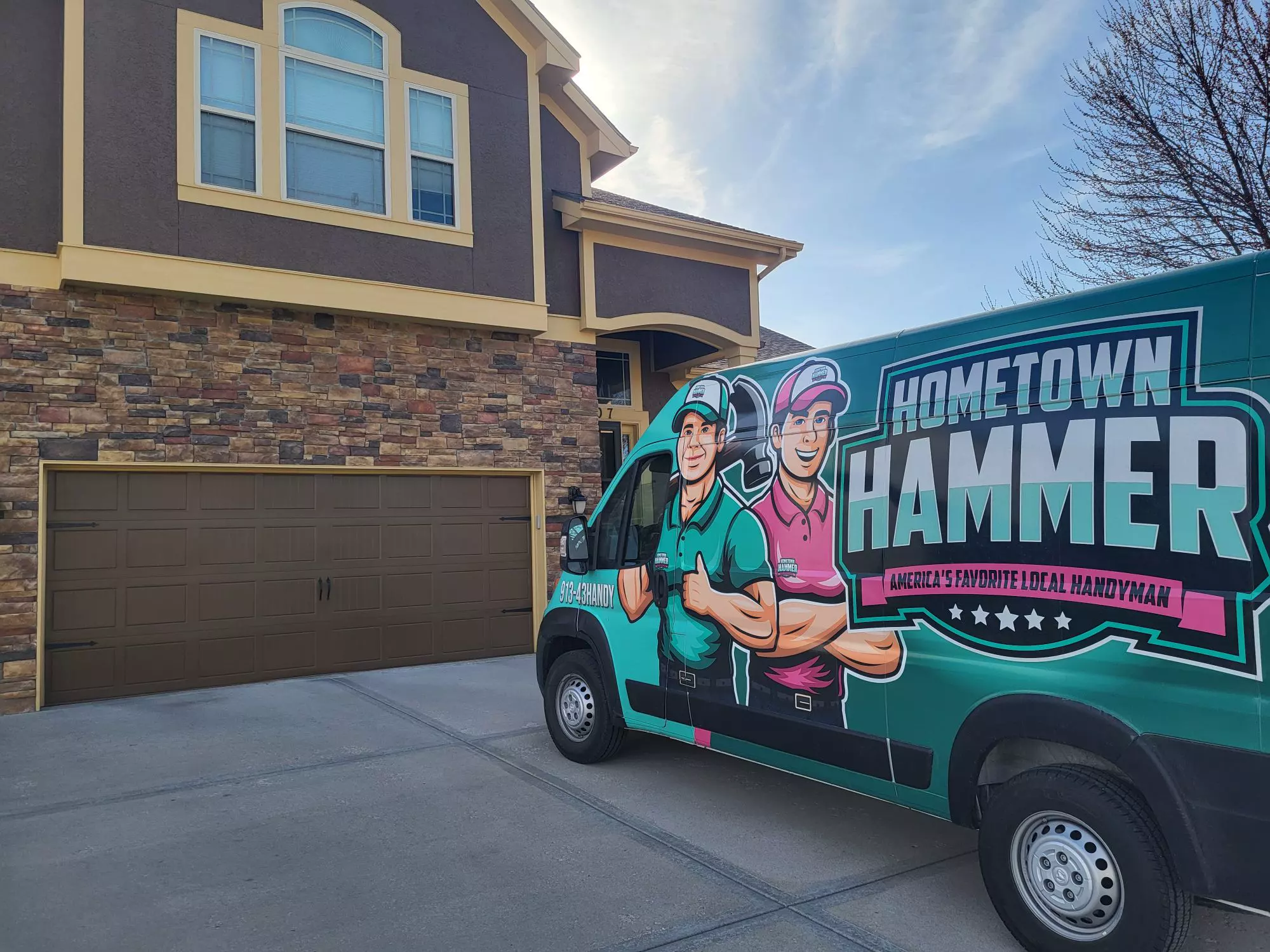 Hometown Hammer van parked outside a Kansas City home
